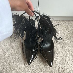Black feather pumps with tie up straps